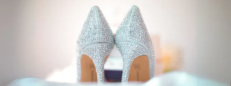 Wedding High Heels: Unique Flawlessly Symbol 3 The back of beautiful diamond high heels in a white glow on a wedding day.